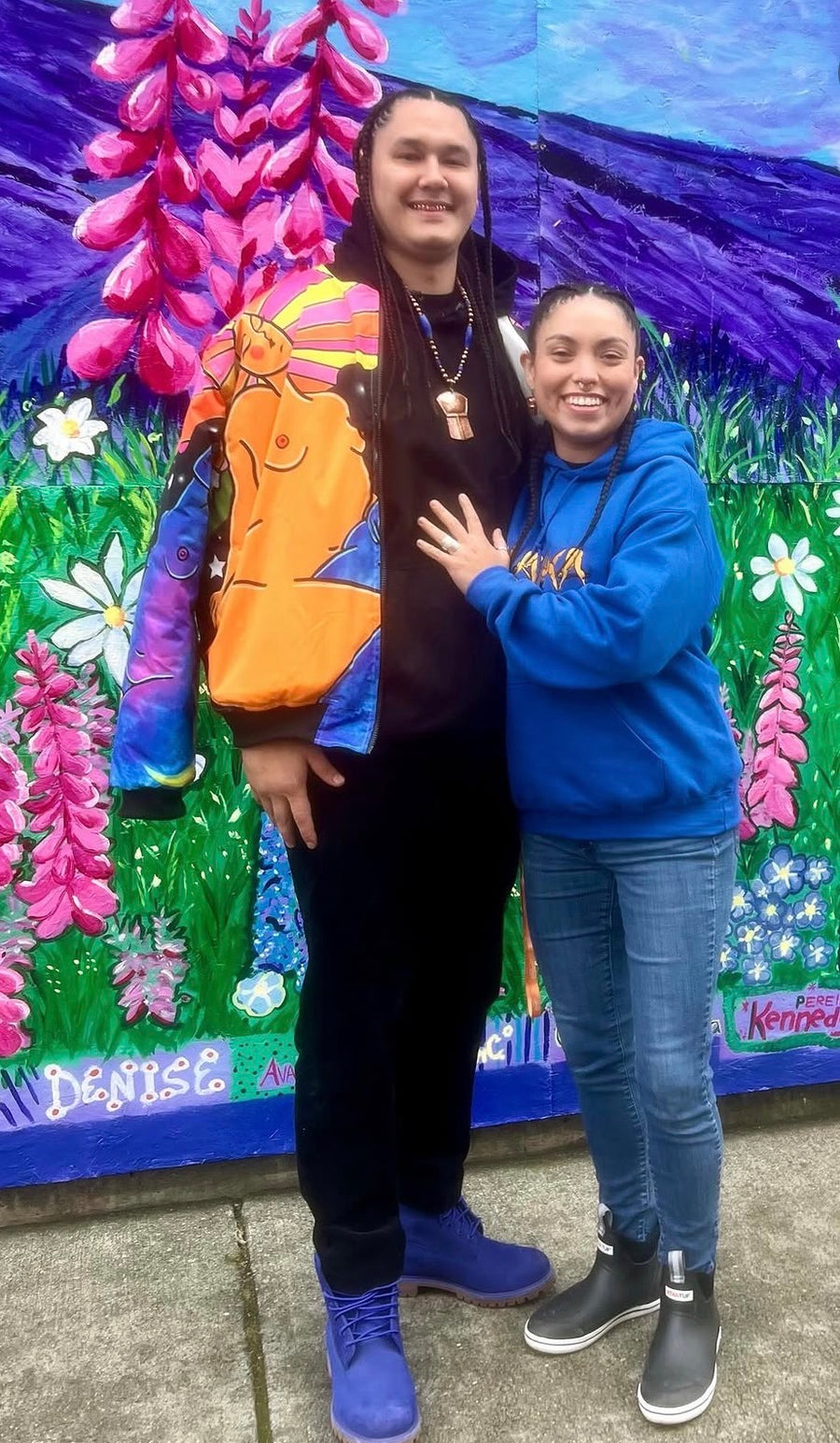 Customer wearing Alaska Embroidered Heavy Blend Hoodie in Blue