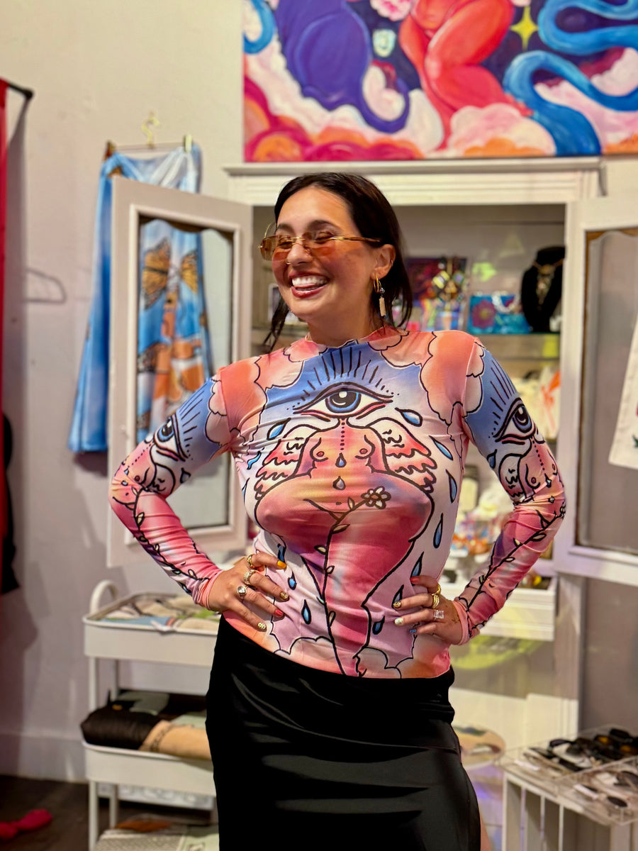 Customer wearing EyeCon Mesh Mockneck Long Sleeve Top