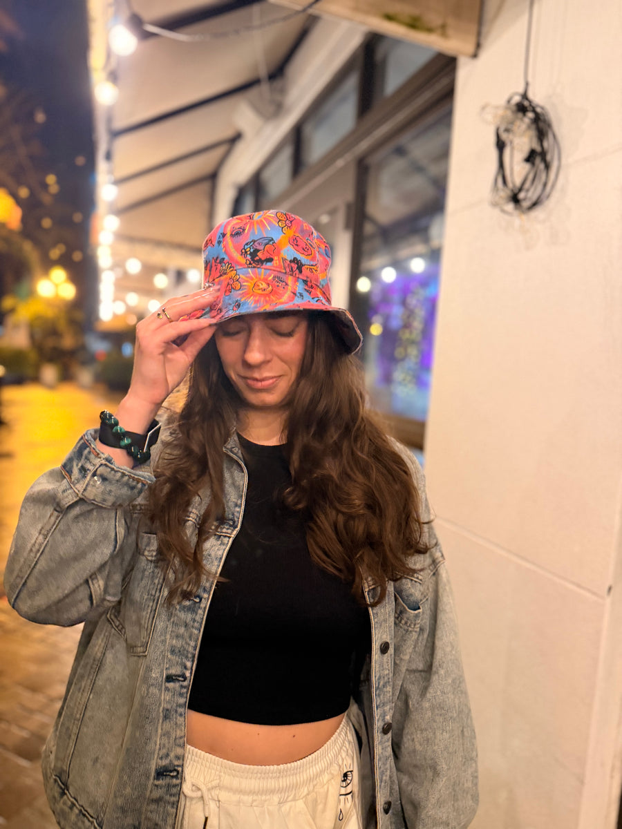 Customer wearing Mirror the Universe Reversible Bucket Hat