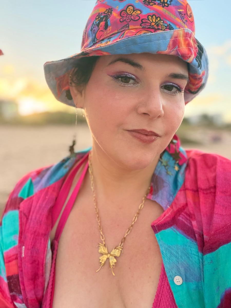 Customer wearing Mirror the Universe Reversible Bucket Hat